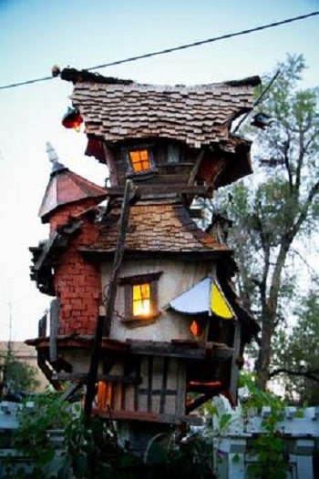 A large four foot decorative birdhouse